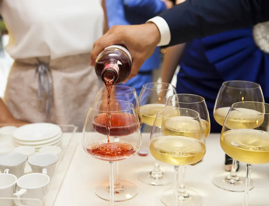 Wine being poured into glasses